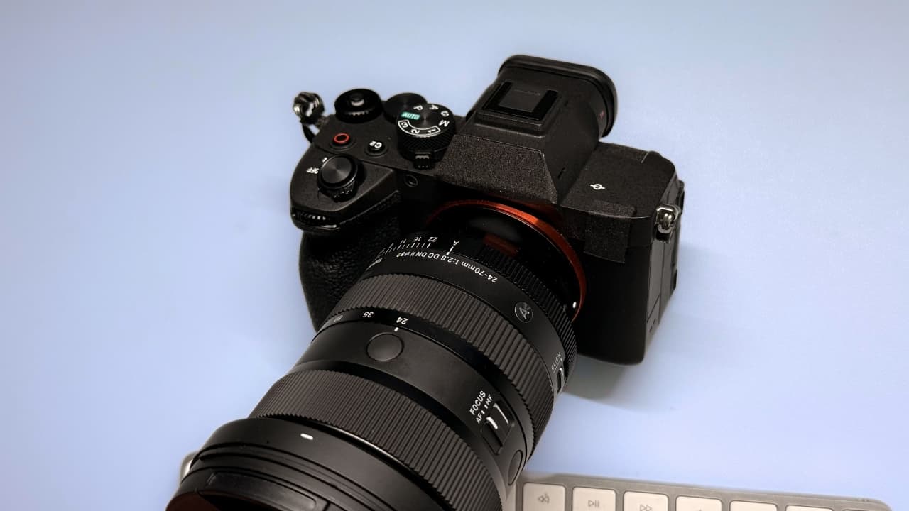 Camera gear with tape over logo